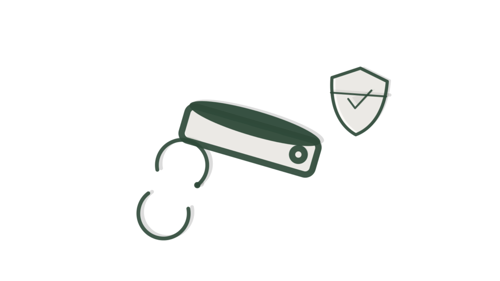 Paper shield in a tray beside sync arrows, showing compliance checked on an ongoing basis.