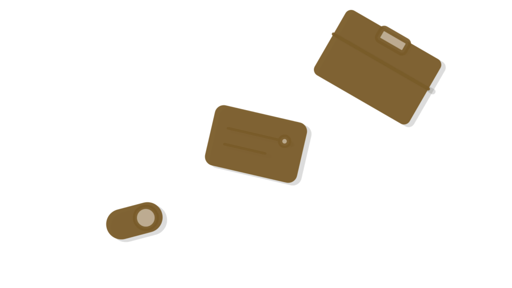 Charcoal toggle switch beside an index card and a brass-cornered box, arranged in a diagonal stack.