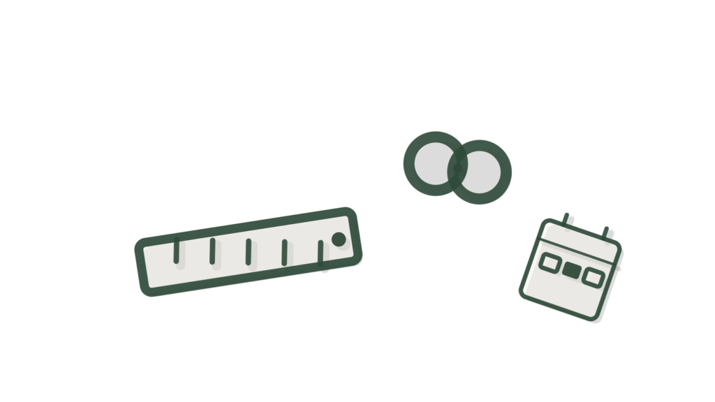 A shallow tray stacked on a deep tray, each with folded paper, showing short and long product copy written separately.
