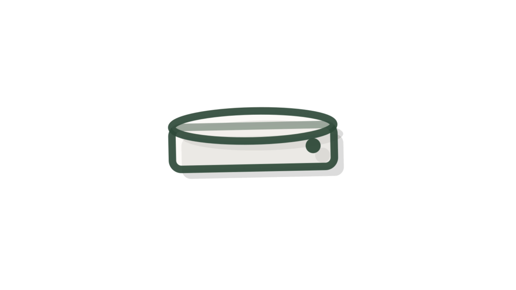 A tray of thread spools with one thread running to a brass thimble, showing one product pointing to the next to suggest.