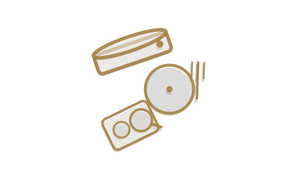 A plate and fork on a small stack of resumes with a green pin, showing kitchen applications sorted during service.