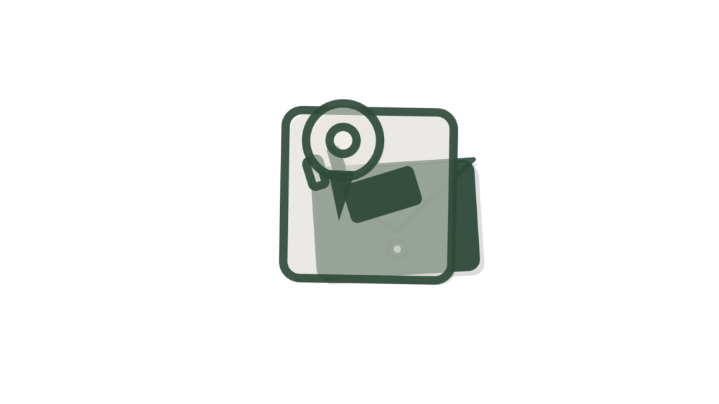 An open blank notebook beside clipped cards and a green ribbon, showing repeated answers gathered into a new article.